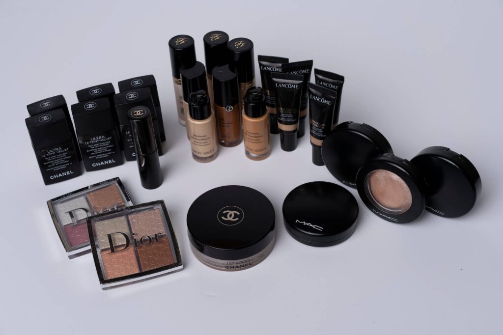 special event makeup artists kit featuring Chanel, Mac and Dior foundation, setting powder and eyeshadow